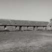 View of byre at N side of courtyard from SW