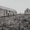 View of threshing barn and byre from W