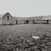 View of courtyard and steading from SE, threshing barn on left