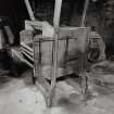 View of grain dresser located on ground floor of the threshing barn