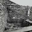 Interior. Pund, detail of remains of stall in north west corner