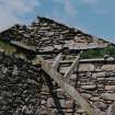 Interior. Pund, detail of raised section of walling in north west corner