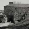 Argyll, Bonawe Ironworks, Lorn Furnace.
General view of West side of furnace showing tapping arch and charging house.