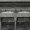 View of sinks (two of four), with grey 'marble' surround, created by a glaze on a clay base.   Photosurvey 9-OCT-1991