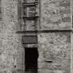 Carnasserie Castle.
General view of entrance doorway and panel.