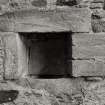 Carnasserie Castle, interior.
Detail of carved water inlet in West wall of ground floor kitchen fireplace.