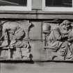 Campbeltown, Hall Street, Campbeltown Library and Museum.
Detail of frieze on East elevation showing a shipbuilder and St. Columba.