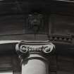 Detail of Ionic capital and lions head mask