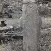 Colonsay, Riasg Buidhe.
View of well-head showing back view of early cross-shaped stone with 'head'.