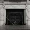 Inveraray Castle, interior.
View of the fireplace. White marble with two Classical maidens holding a swag attached to a central urn.