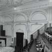 Interior.  Auditorium, Balcony, decorative plasterwork on W wall, view from E