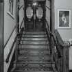 Interior.  Circle, lobby, view of steps to manager's office