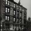 General view.
Titled below: '12 Dwellings, in all, 33 apartments. 16 Taps, 4 W.Cs.'