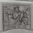 Interior. Detail of carved wood Station of the Cross 'Jesus dies on the cross'.