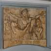Interior. Detail of carved wood Station of the Cross 'Jesus dies on the cross'.