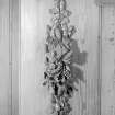 Interior-detail of carved overmantel by Grinling Gibbons (?) in billiard room by Lorimer