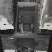 Glasgow, 13-23 Tradeston Street, Randolph & Elder Engine Works, interior.
View of East range, suspended floor system, third floor, box casting supporting upper length of tie rod beneath roof truss.