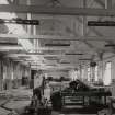 Glasgow, 125-129 Shuna Street, Glasgow Rubber Works
Sundries Department (item 12F on plan, first floor): interior view from west of east end of range, taken immediately prior to demolition