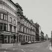 General view of St Vincent Place from W at junction with Buchanan Street, also showing Pitlochry Knitwear.