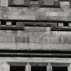 Detail of 1896 inscription on West facade.