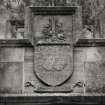 Detail of armorial panel on South facade.
Insc: 'De Tout Mon Couer'.