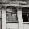 Glasgow, 17-39 Watson Street.
Detail of specimen second floor window including carved capitals.