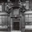 Glasgow, 28 West Campbell Street, McGeoch's Building.
View of main entrance with carved figures over pediment.