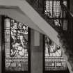 Interior.
View of stained glass window lighting main staircase.