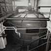 Mash House: elevated view of cast-iron fabricated mash tun, made by Robert Melvin Ltd, Engineers, of Alloa