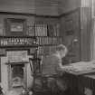 Studio, interior.
View of Alexander N Paterson at his drawing board.