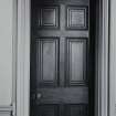 Interior.
Detail of specimen door and surround in entrance hall.