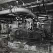 Interior view of Carbonation and Recovery Basement, showing the Carbon Dioxide Gas Compressors which supplied the gas for the Carbonation Plant Saturators.  The Carbon Dioxide was supplied from the flue gases from the refinery's main boilers (T&L No.: 21177/11)