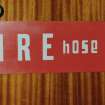 Interior.
Detail of fire hose signage.