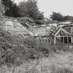 View of greenhouse at north end of walled garden