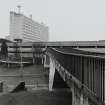 View from pedestrian bridge towards Plaza Tower and car park