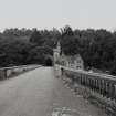 Distant view (along Maudslie bridge) from NE