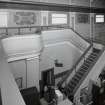 View of staircase leading up to gallery from SE