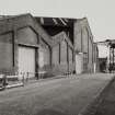 View from S of SE gables of Liner and Stores bays on Ratho 			Street, photographed 10 August 1993