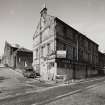 View from NE of E corner of works, showing Ratho Street (left) and East Hamilton Street (right), photographed 10 August 1993