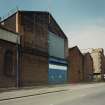 View from NNE of central part of N frontage onto East Hamilton Street, the area of the works containing Assembly and Fitting Shops, photographed 10 August 1993