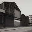 View from NNE of central part of N frontage onto East Hamilton Street, the area of the works containing Assembly and Fitting Shops, photographed 10 August 1993