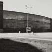 View from NNE of W part of works, containing Light and Medium Machine Shops (with part of offices behind), photographed 10 August 1993