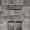 SE Elevation. Detail of 1926 memorial plaque inscribed " THE KIRK OF GRENOCK BUILT BY JOHANNE SCHAW AD 1591 TRANSFERRED FROM THE ORIGINAL SITE NOW OCCUPIED BY HARLAND AND WOLFF'S SHIPYARD AD 1926"