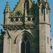 Detail of north side of tower showing carved heads and gargoyles