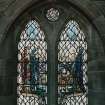 Interior.  View of stained glass window in north wall 'My soul doth magnify the Lord'