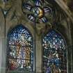 Interior.  Detail of stained glass window in north wall of chancel