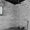 Interior.  Tower, 1st. floor, room with bell rope, view from south west