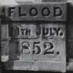 Detail of commemorative stone on E parapet wall.