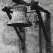 Detail of bell on N side of W stair tower.
