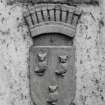 Detail of armorial plaque on gate pier.